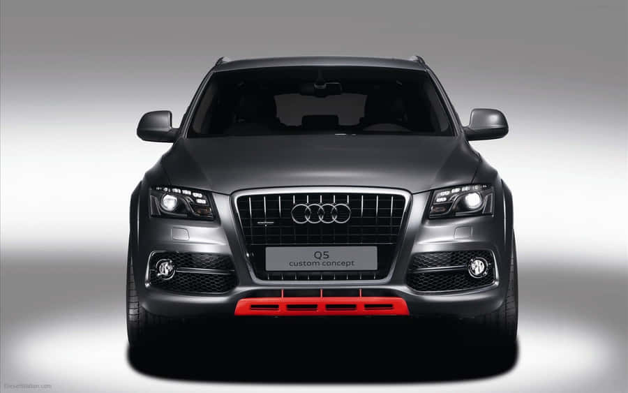 Sleek Black Audi Q5 Suv In A Scenic Nature Setting Wallpaper
