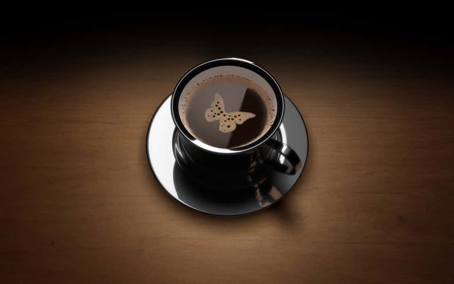 Sleek Black Coffee Cup Contemplation Wallpaper