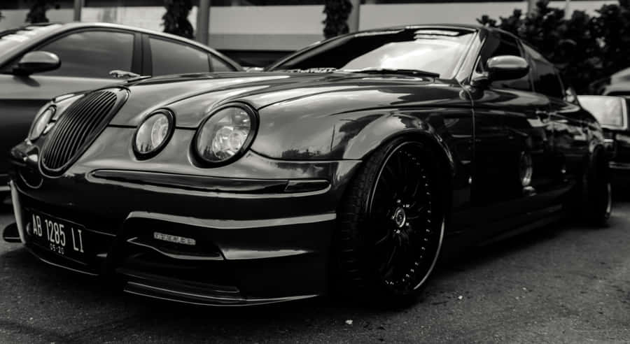 Sleek_ Black_ Sports_ Car_ Monochrome Wallpaper