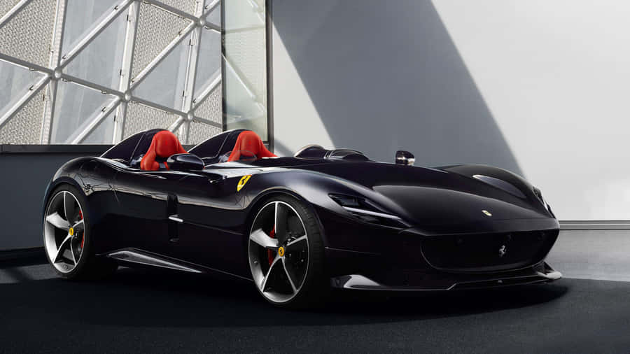 Sleek Black Sports Car Showroom Wallpaper