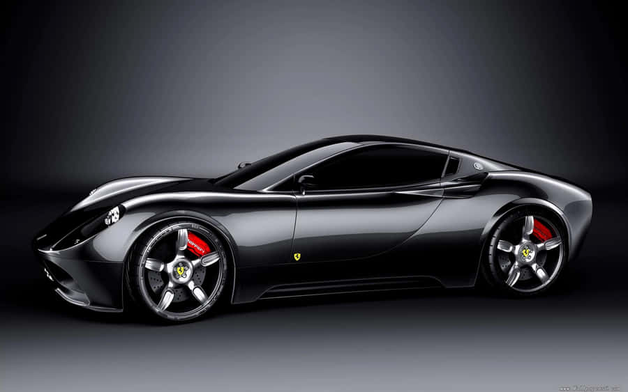 Sleek Black Sports Car Studio Shot Wallpaper