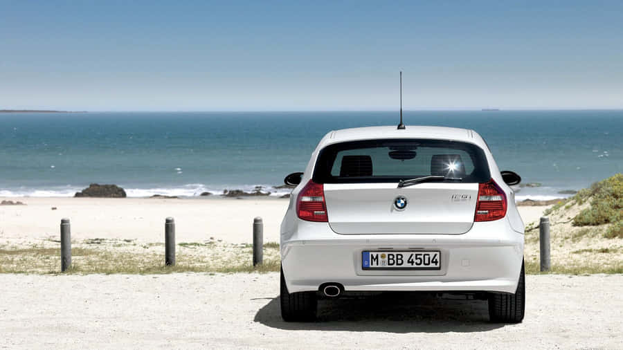 Sleek Bmw 1 Series In An Urban Environment Wallpaper