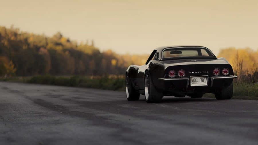 Sleek Chevrolet Corvette Stingray In Action Wallpaper