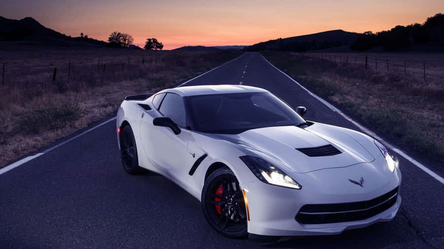 Sleek Chevrolet Corvette Stingray In Action Wallpaper