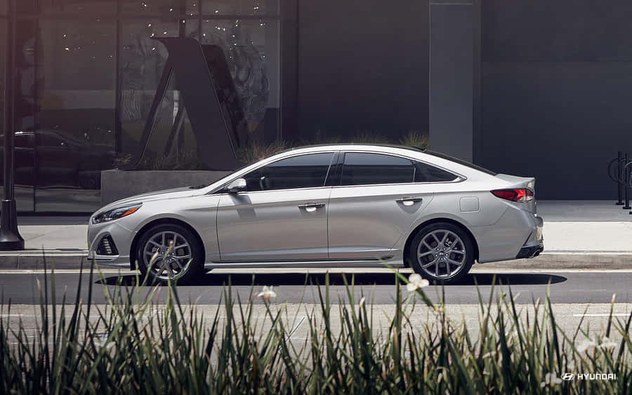 Sleek Design Hyundai Sonata In Red Wallpaper
