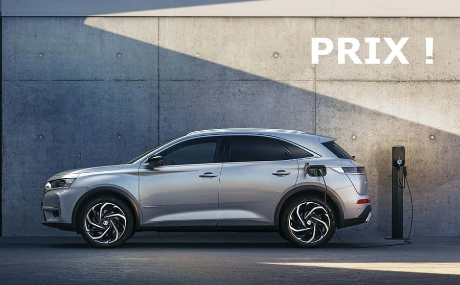 Sleek Ds 7 Crossback E-tense Gliding On The Road Wallpaper