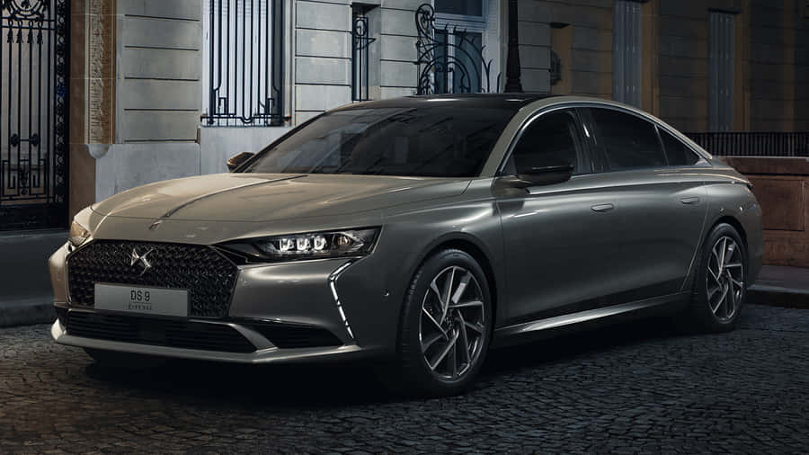 Sleek Ds Automobile On The Road Wallpaper