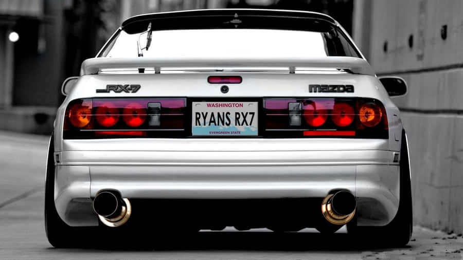 Sleek Elegance Of The Rx7 Fc Car Model Wallpaper