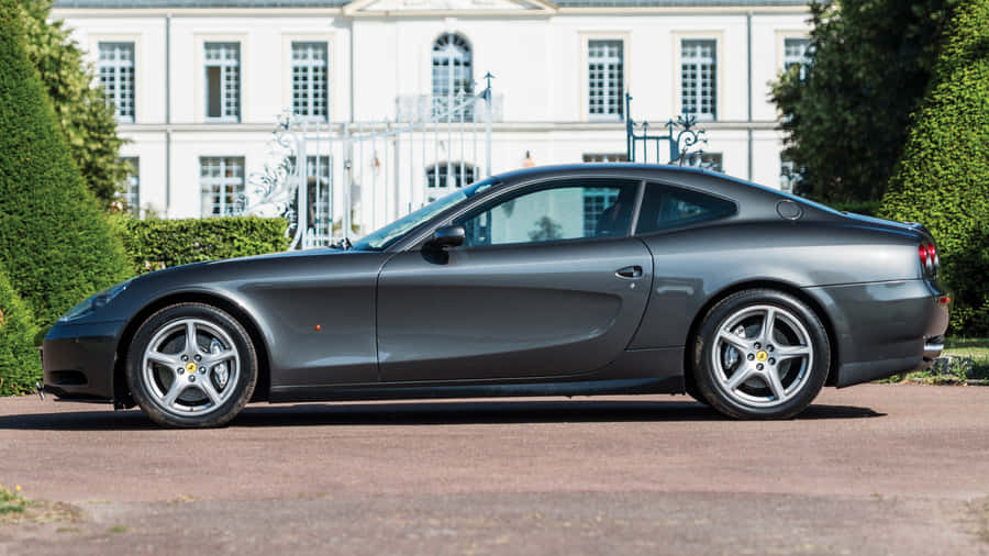 Sleek Ferrari 612 Scaglietti On The Road Wallpaper
