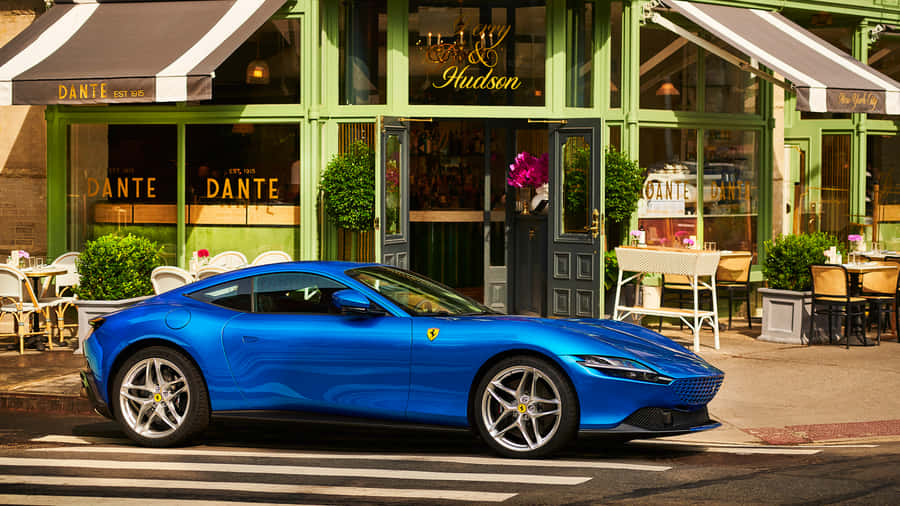 Sleek Ferrari Roma Dominating The Open Road Wallpaper