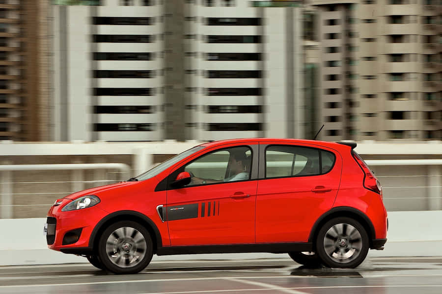 Sleek Fiat Palio In Stunning Scenery Wallpaper
