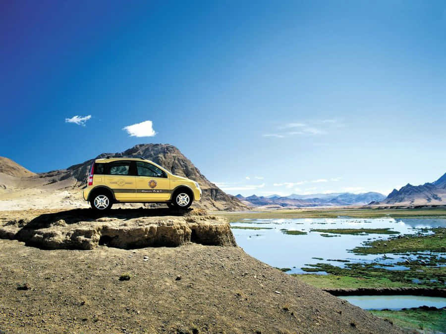 Sleek Fiat Panda In Its Natural Habitat Wallpaper