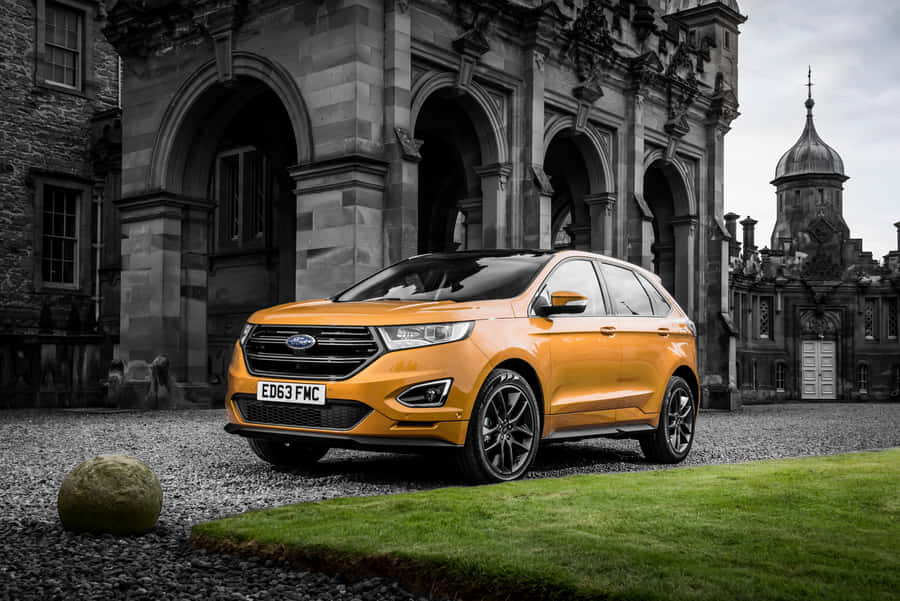 Sleek Ford Edge Gliding On The Open Road Wallpaper
