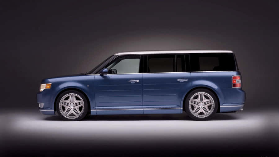 Sleek Ford Flex Cruising Down The Open Road Wallpaper