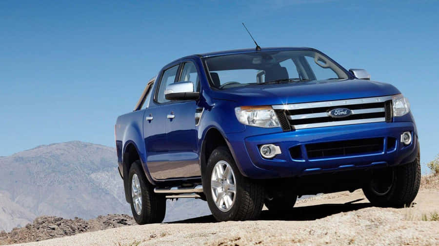 Sleek Ford Ranger In A Stunning Wilderness Background Wallpaper