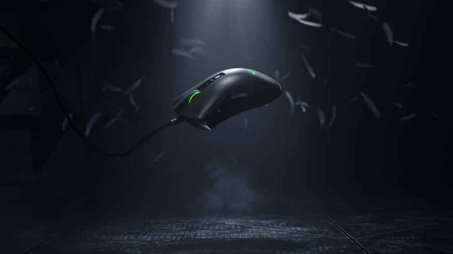 Sleek Gaming Mouse Illuminated In Rgb Lights Wallpaper