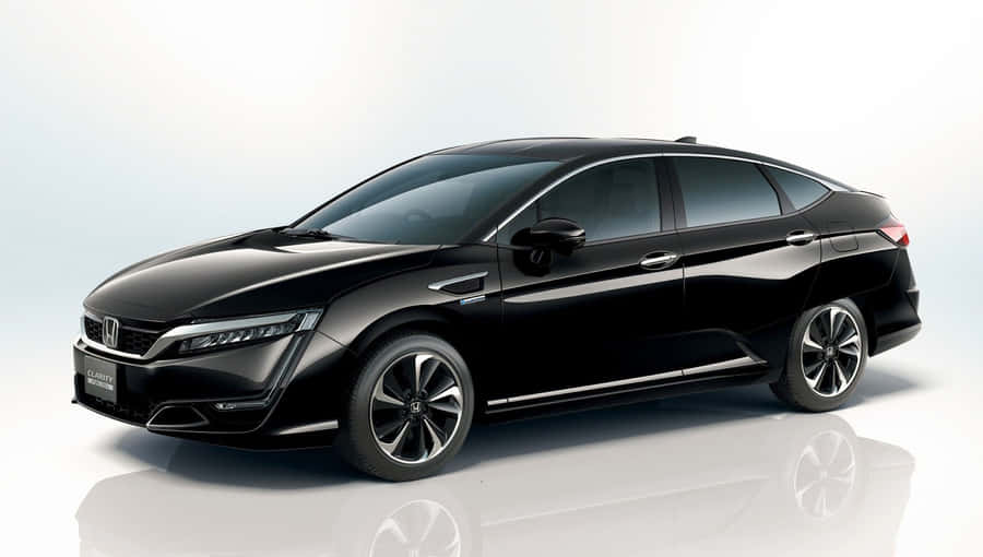 Sleek Honda Clarity In Urban Landscape Wallpaper
