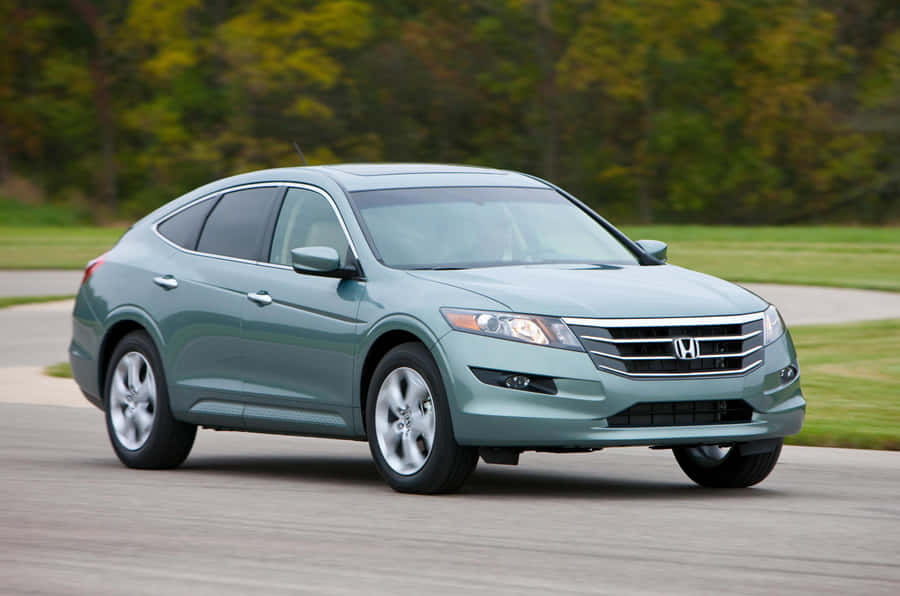 Sleek Honda Crosstour In Action Wallpaper