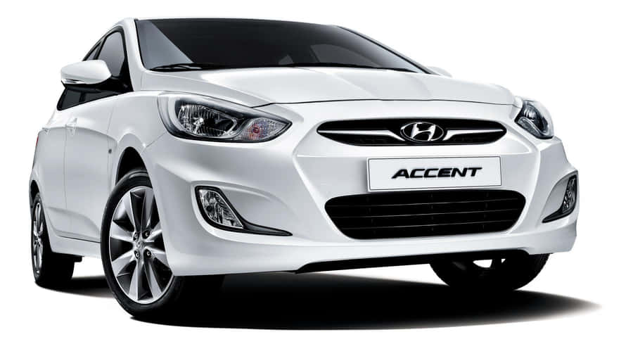Sleek Hyundai Accent In Motion Wallpaper