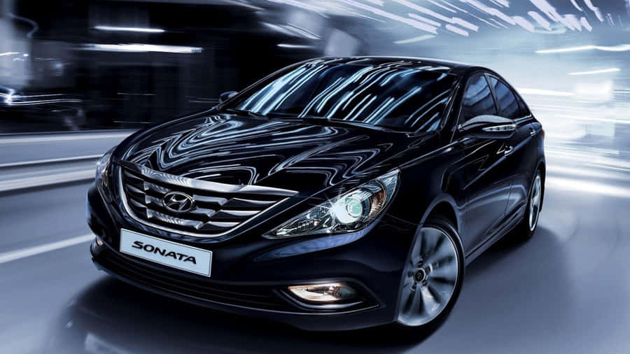 Sleek Hyundai Sonata In Motion Wallpaper