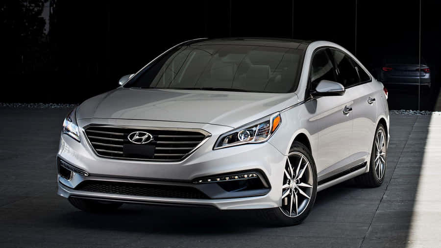 Sleek Hyundai Sonata On The Road Wallpaper