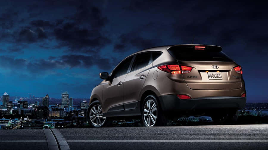 Sleek Hyundai Tucson On The Road Wallpaper