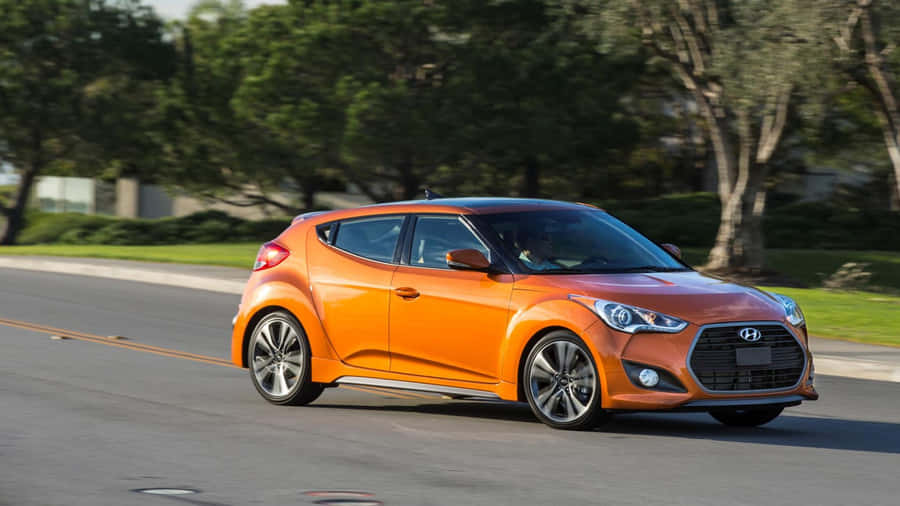 Sleek Hyundai Veloster In A Scenic Cityscape Wallpaper