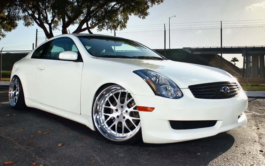 Sleek Infiniti G35 Parked In An Urban Setting Wallpaper