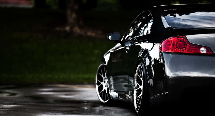 Sleek Infiniti G35 Sedan In Action Wallpaper