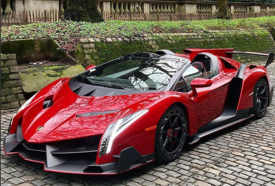 Sleek Lamborghini Veneno On The Race Track Wallpaper