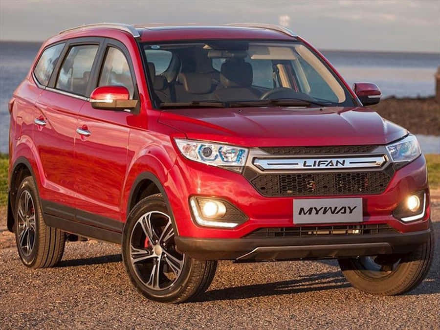 Sleek Lifan Motorcycle Cruising On The Highway Wallpaper