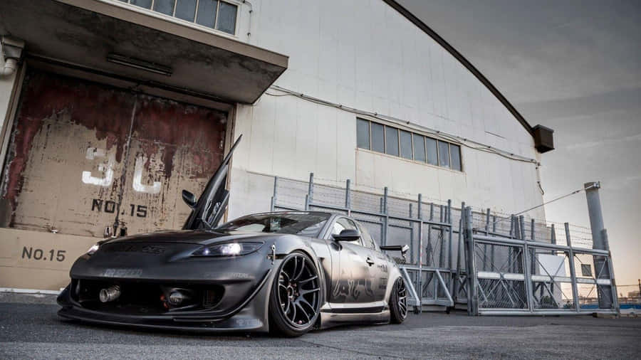 Sleek Mazda Rx-8 Sports Car Wallpaper