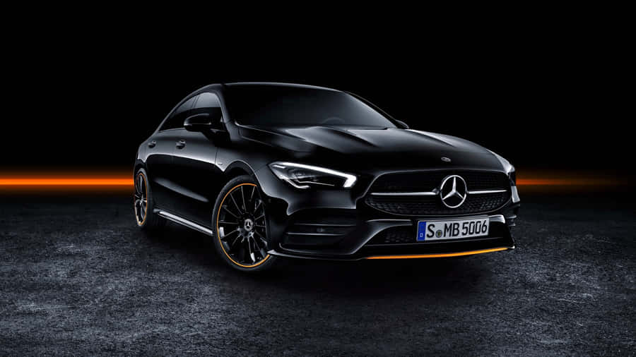 Sleek Mercedes Benz Cla-class In A Mesmerizing Night Drive Wallpaper