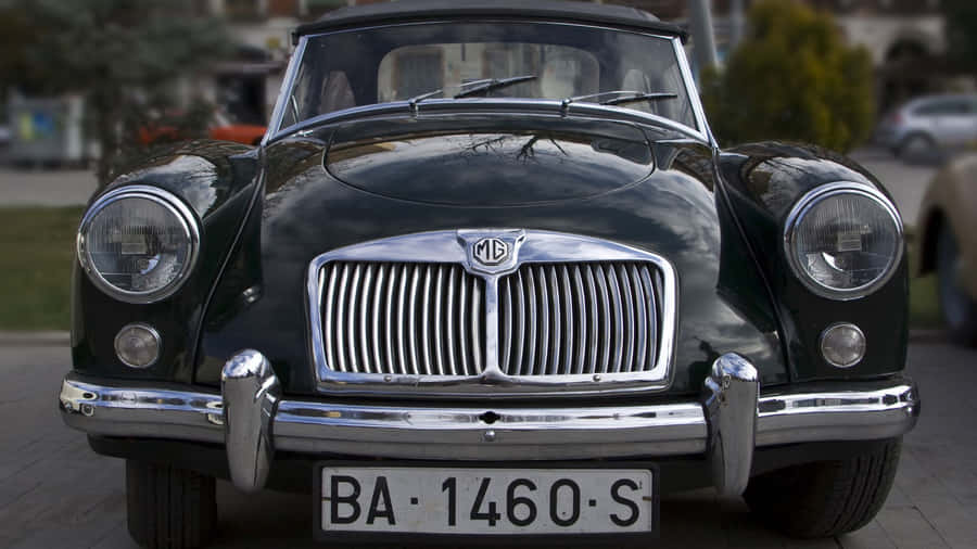 Sleek Metallic Mg Sports Car Wallpaper