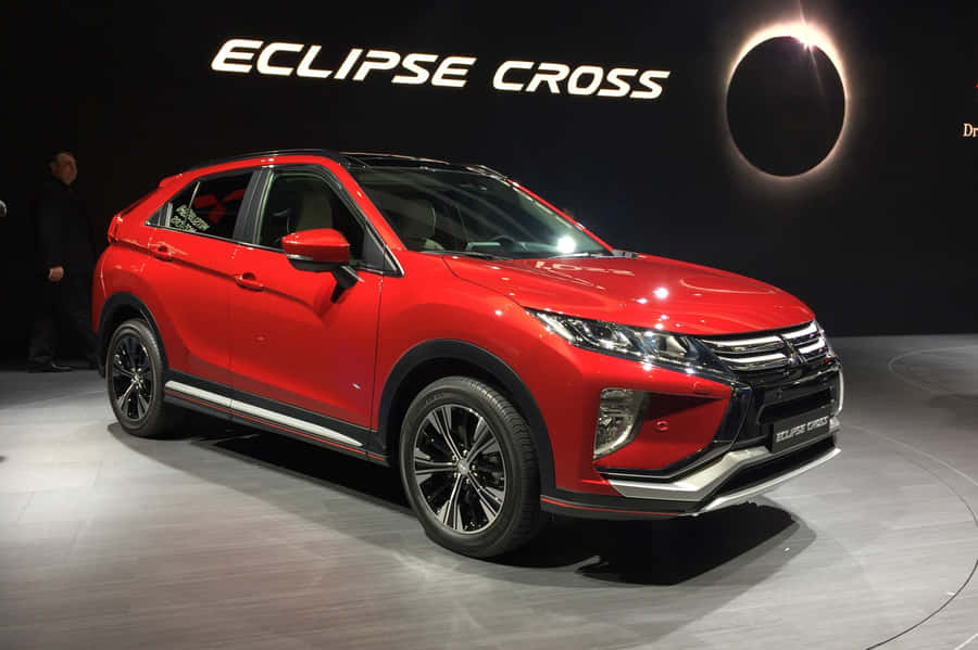 Sleek Mitsubishi Eclipse In Full Throttle Wallpaper