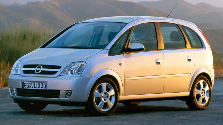 Sleek Opel Meriva Car In The Outdoors Wallpaper
