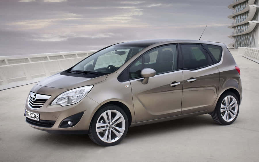 Sleek Opel Meriva Striding Forward Wallpaper