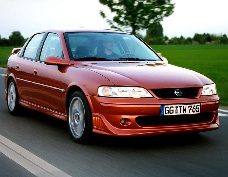 Sleek Opel Vectra In Light Silver Wallpaper