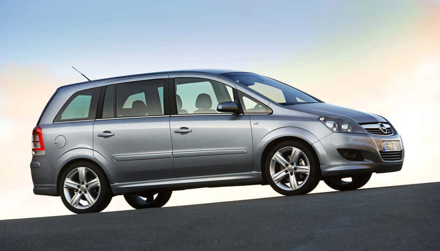 Sleek Opel Zafira In A Picturesque Setting Wallpaper