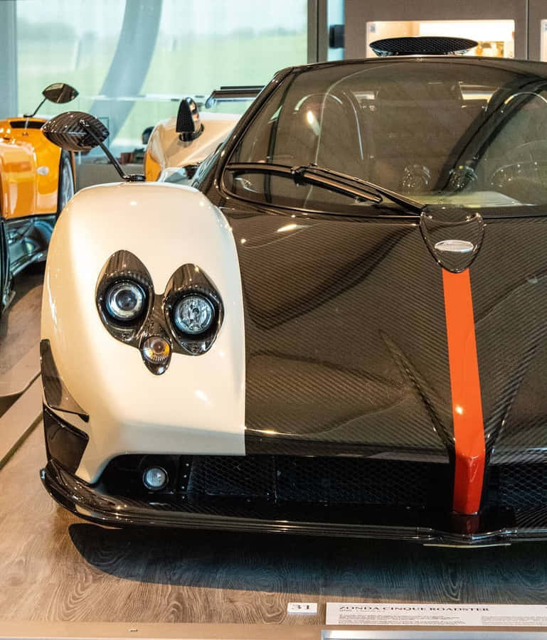 Sleek Pagani Zonda C12 Roadster In Stunning Outdoor Setting Wallpaper