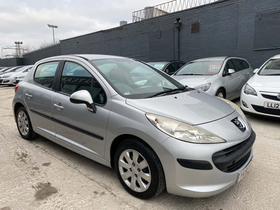 Sleek Peugeot 207 Ready For A Ride Wallpaper