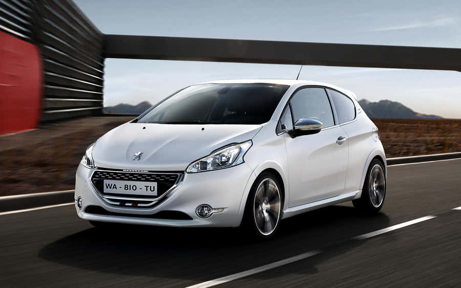 Sleek Peugeot 208 In Motion Wallpaper