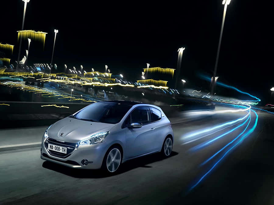 Sleek Peugeot 208 In Motion Wallpaper