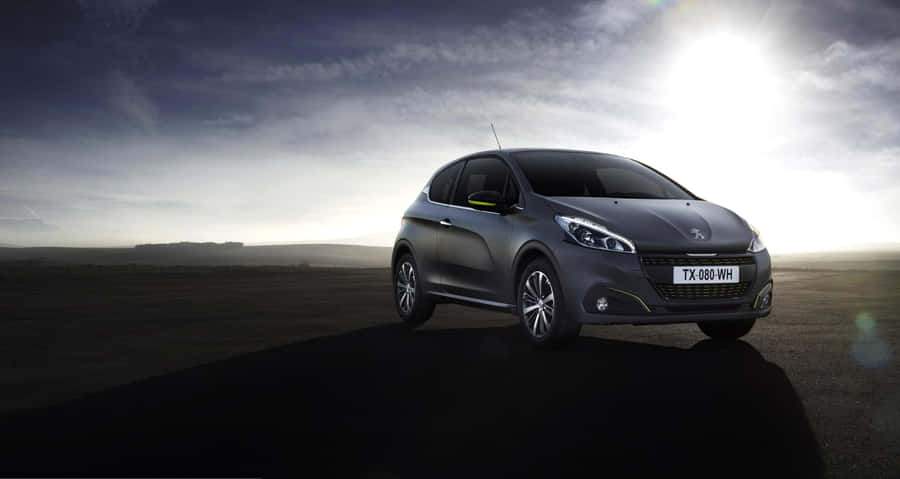 Sleek Peugeot 208 In Natural Setting Wallpaper