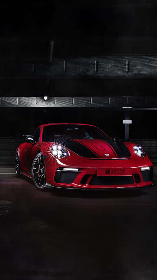 Sleek Porsche On An Open Road Wallpaper