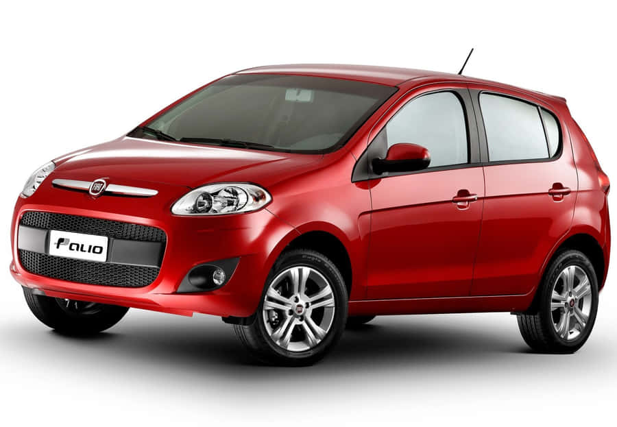 Sleek Red Fiat Palio In Action Wallpaper