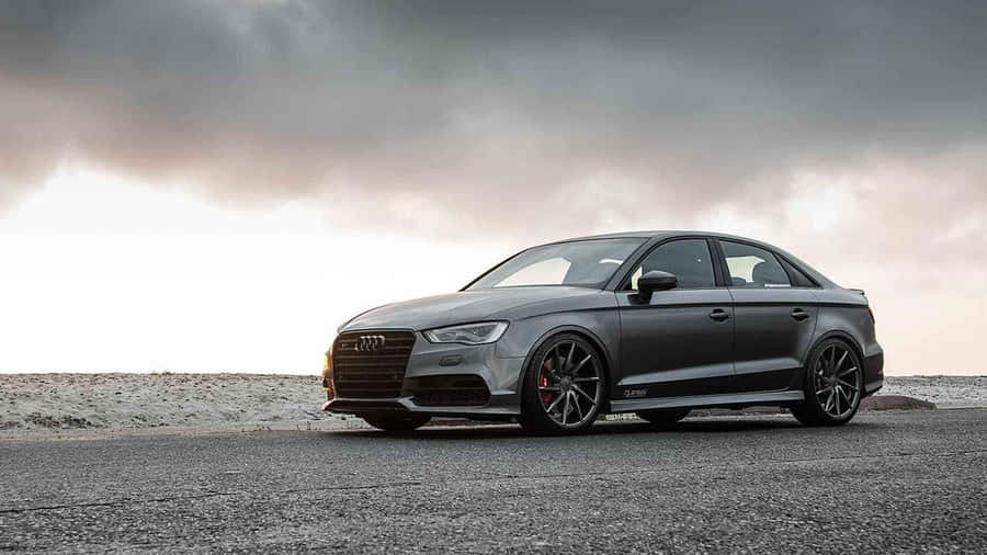 Sleek Sedan In Motion Wallpaper