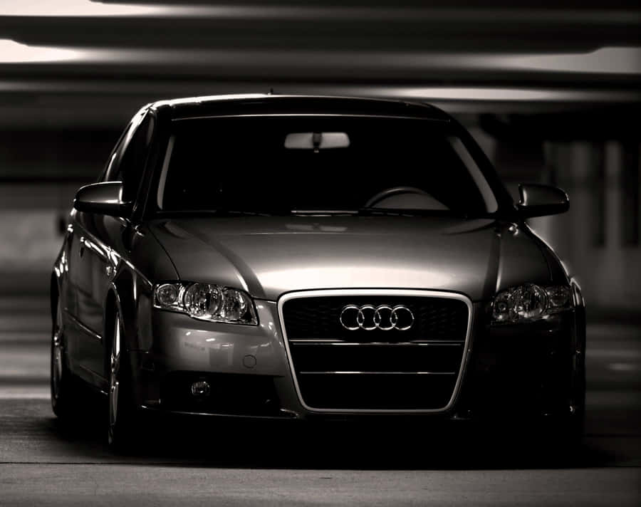 Sleek Silver Audi A3 Parked On The Street Wallpaper