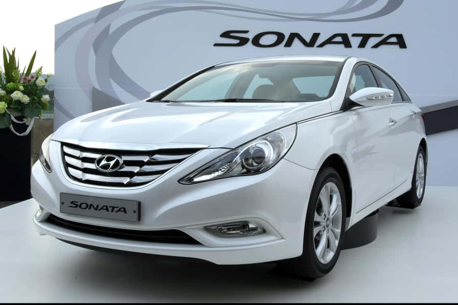 Sleek Silver Hyundai Sonata Parked Outdoors Wallpaper