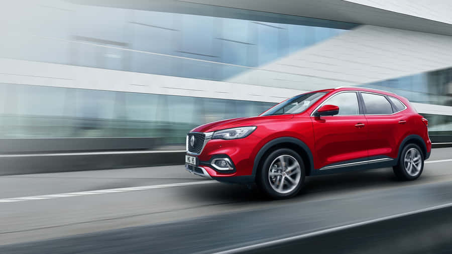 Sleek Silver Mg Sports Car Parked In An Urban Setting Wallpaper